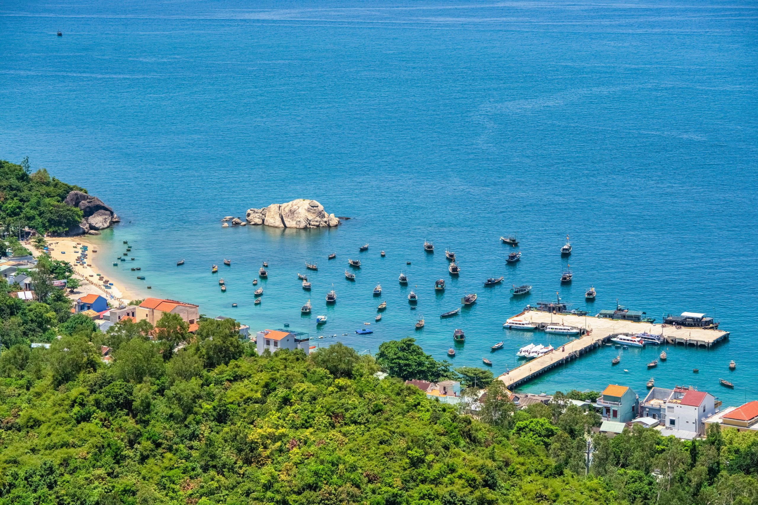 Cham Islands offer pristine, white sand beaches and crystal-clear waters.