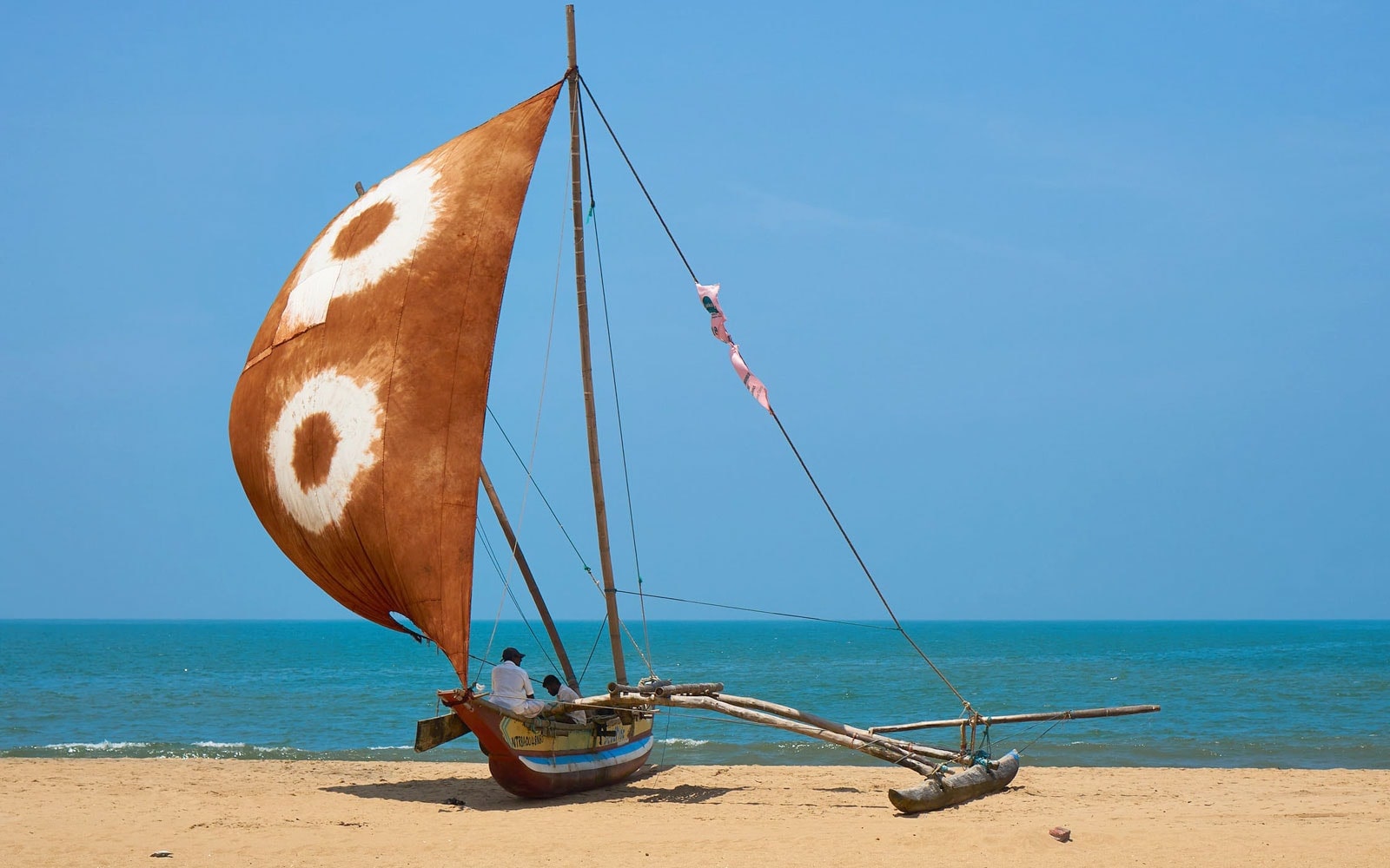 Negombo Beach features a long stretch of golden sand.