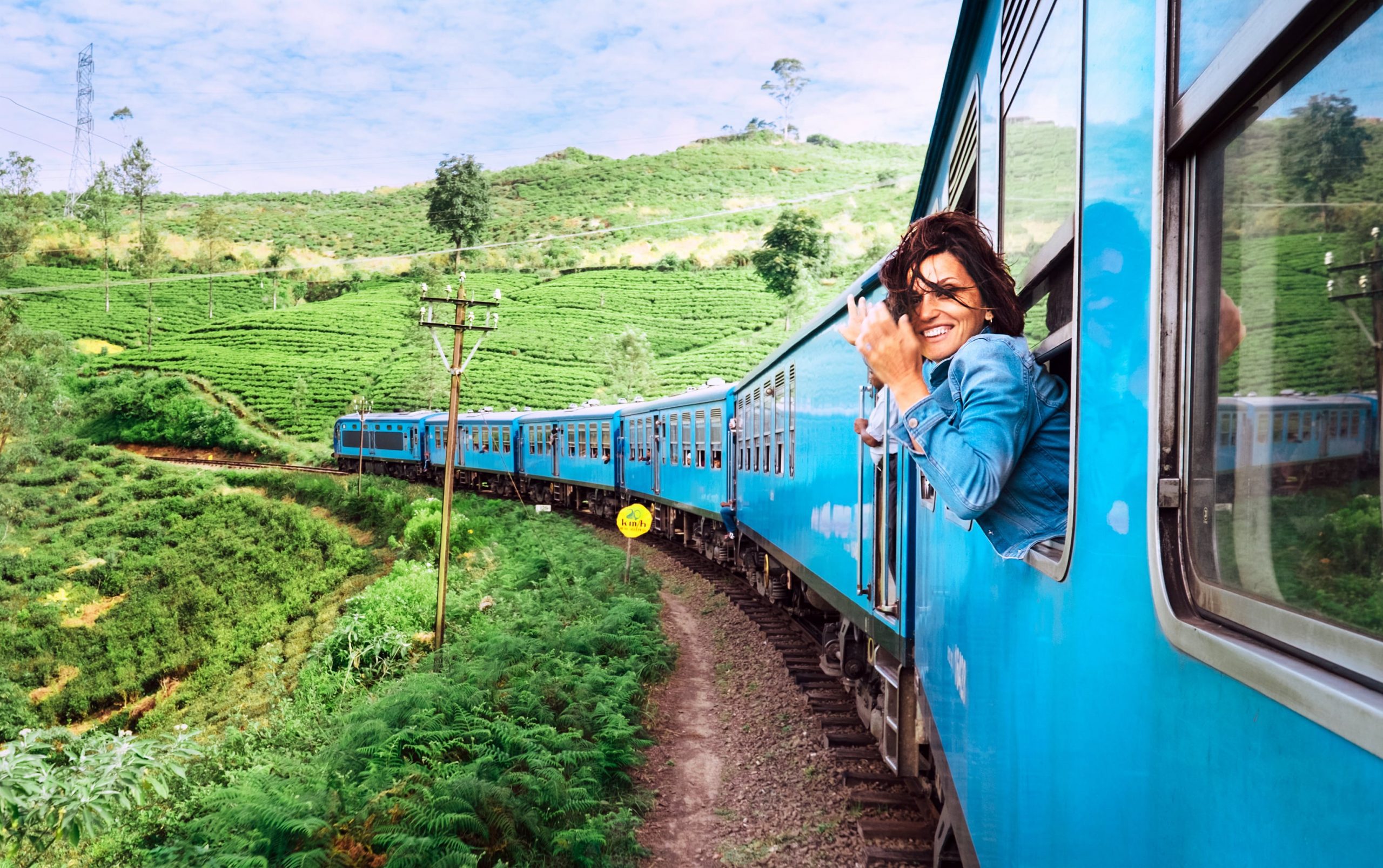 Shared smiles and conversations with curious fellow travellers on the Sri Lanka train.