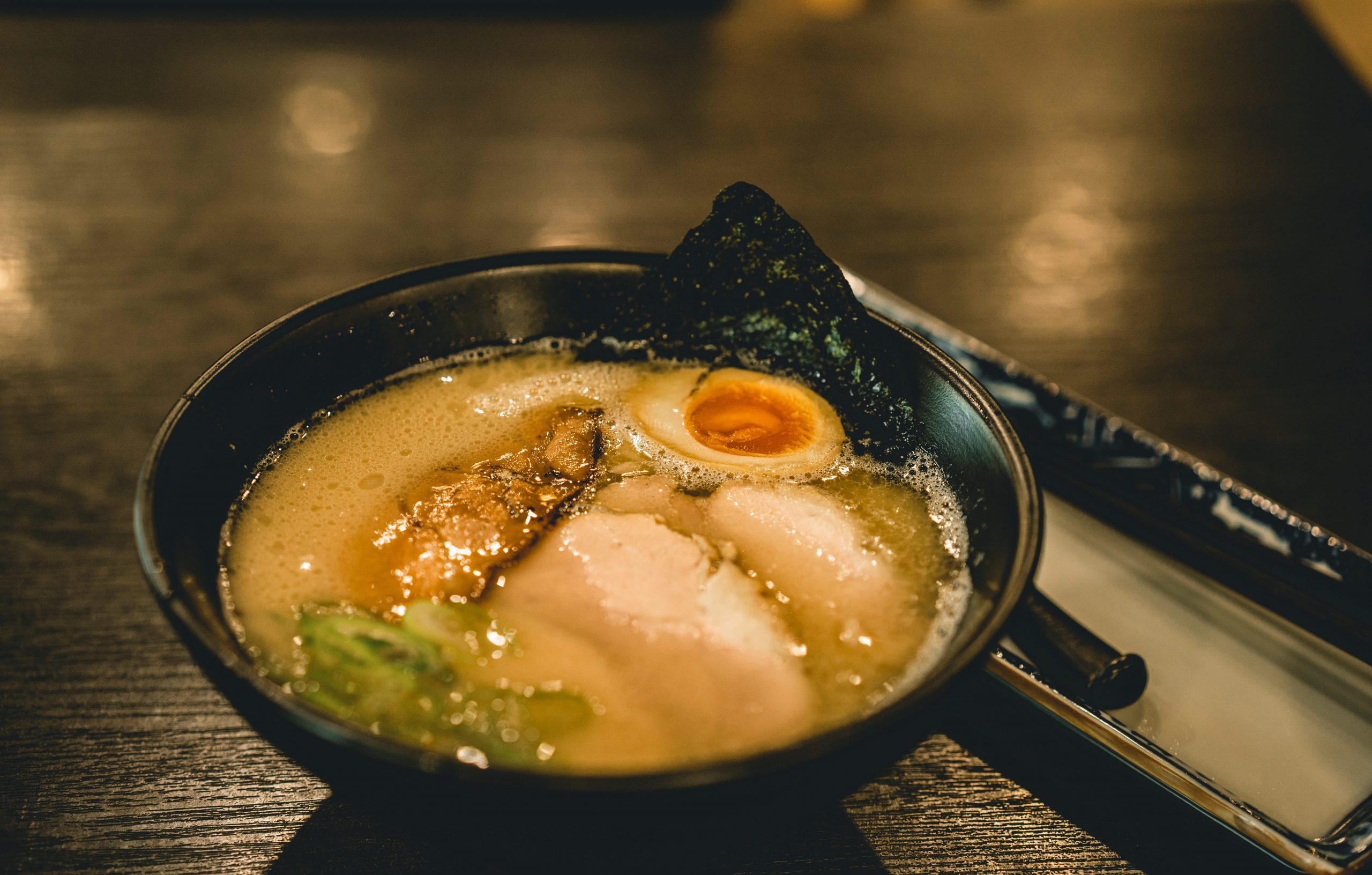 Fukuoka is world-famous for its ramen culture, especially Hakata ramen.