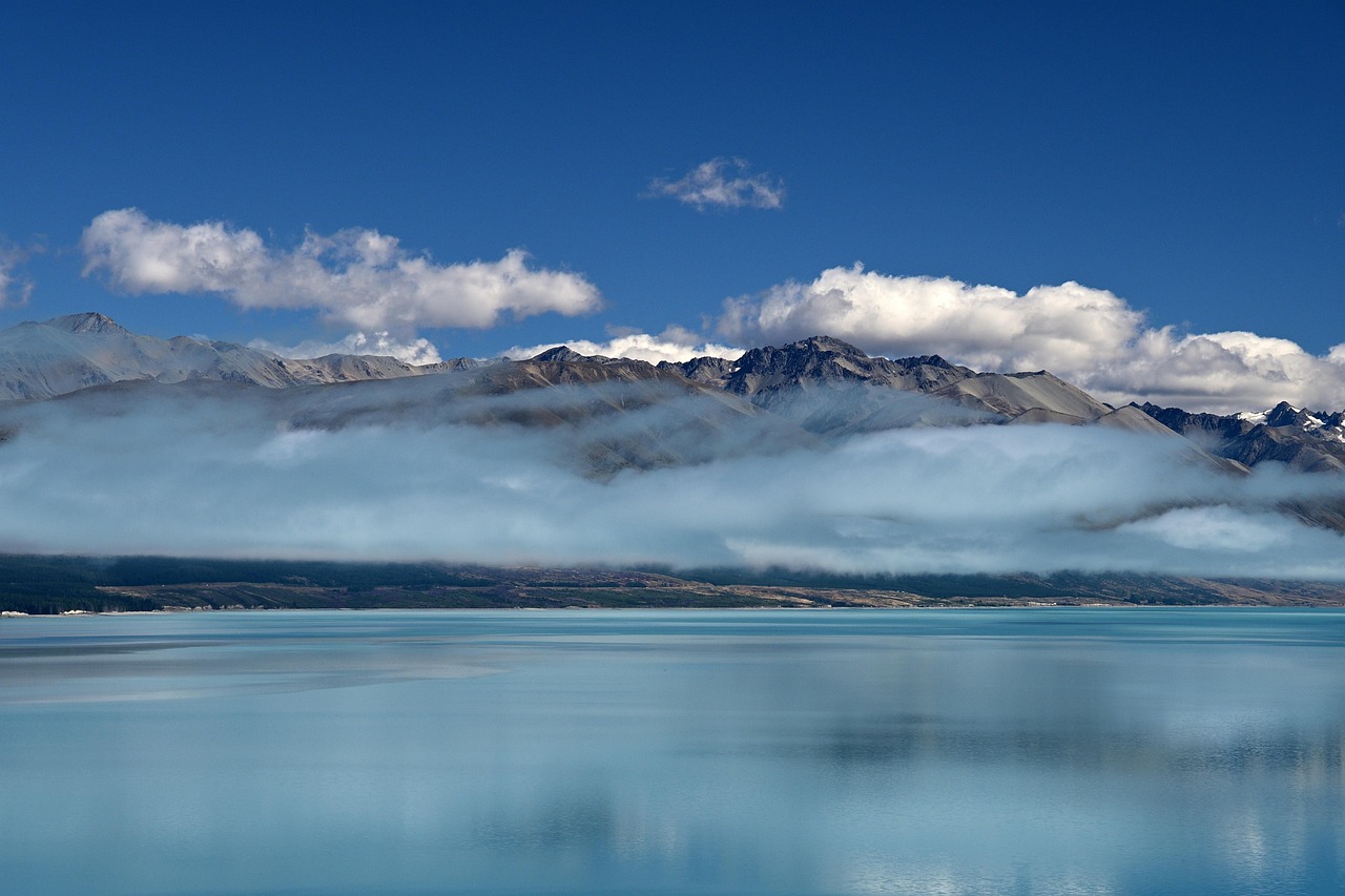 Lake Pukaki’s turquoise glow rests beneath the Southern Alps’ snowy peaks in November.