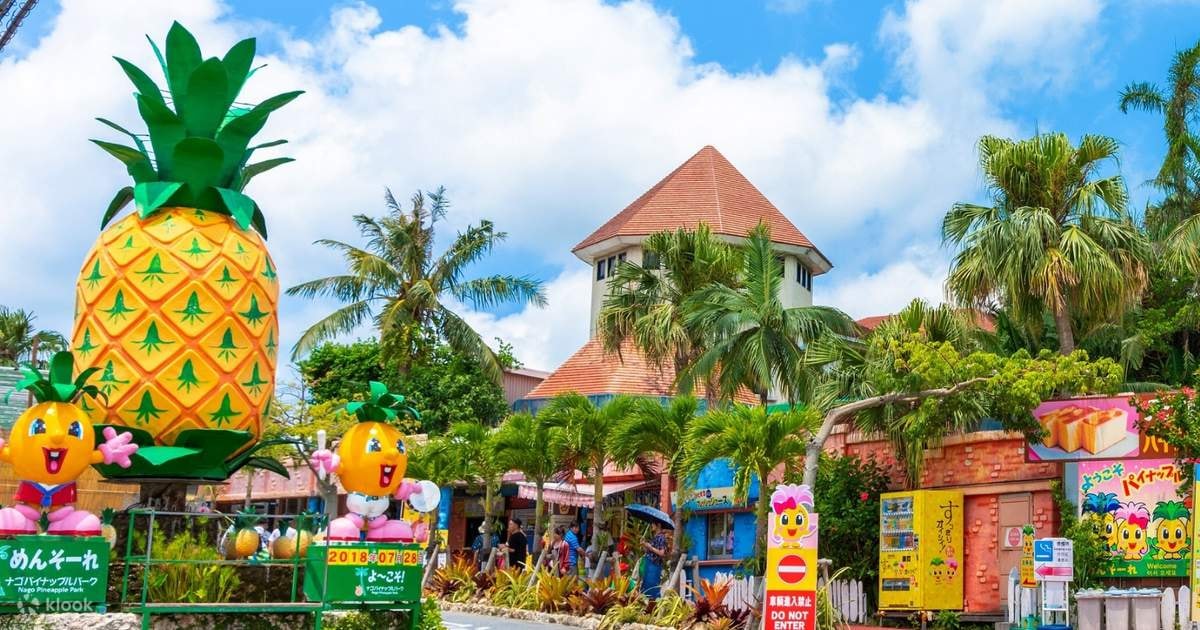 The park is filled with colorful pineapple statues and decorations.