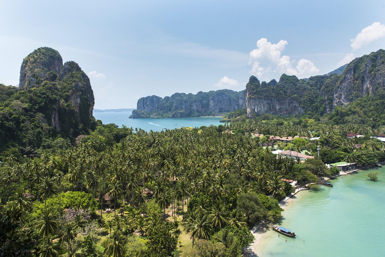 The iconic limestone cliffs of Railay Beach, a haven for adventure seekers in Krabi, Thailand.