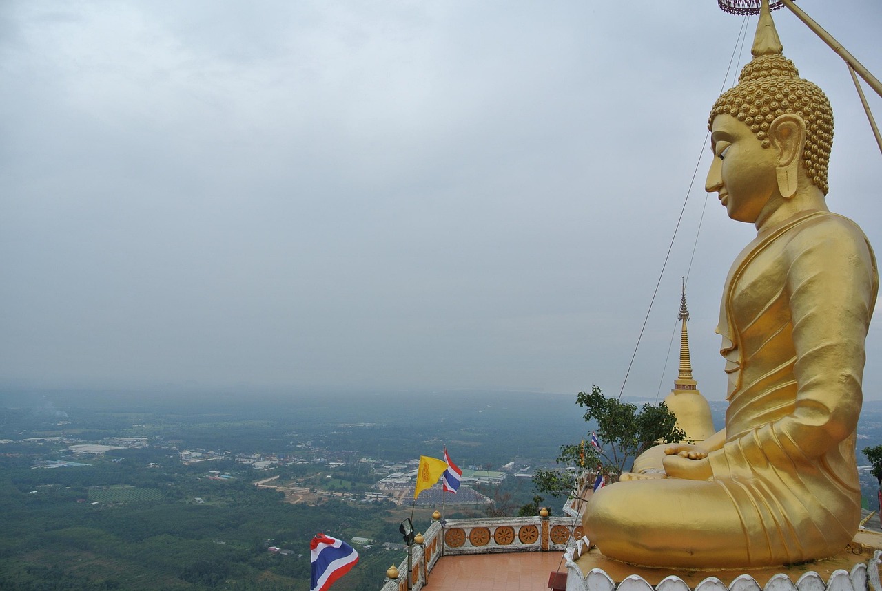 The sacred Tiger Cave Temple offers spiritual serenity and breathtaking sunrise vistas after a rewarding climb.