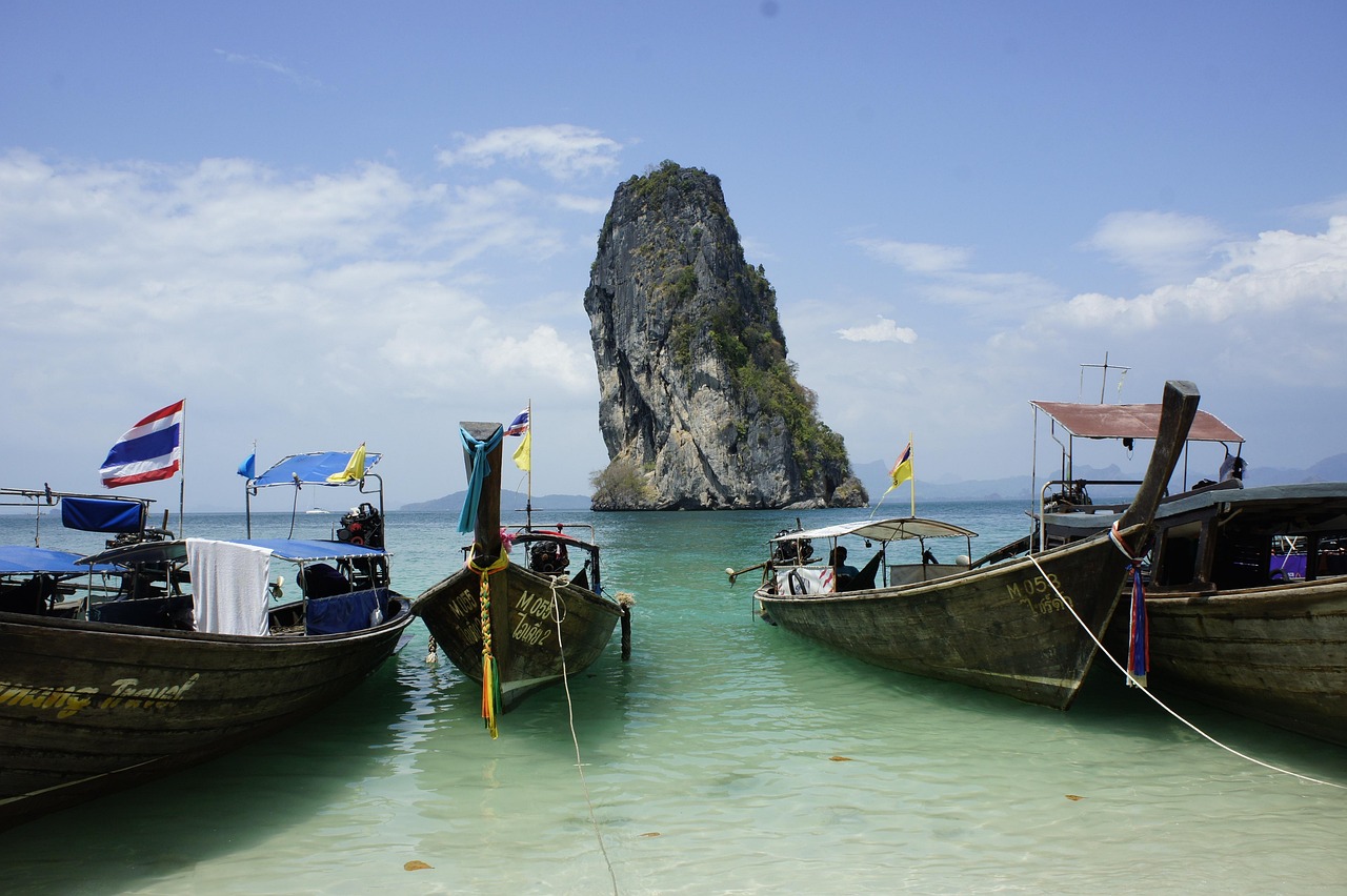 Glide across turquoise waters by long-tail boat to discover Krabi’s spectacular Four Islands, each with a story to tell.