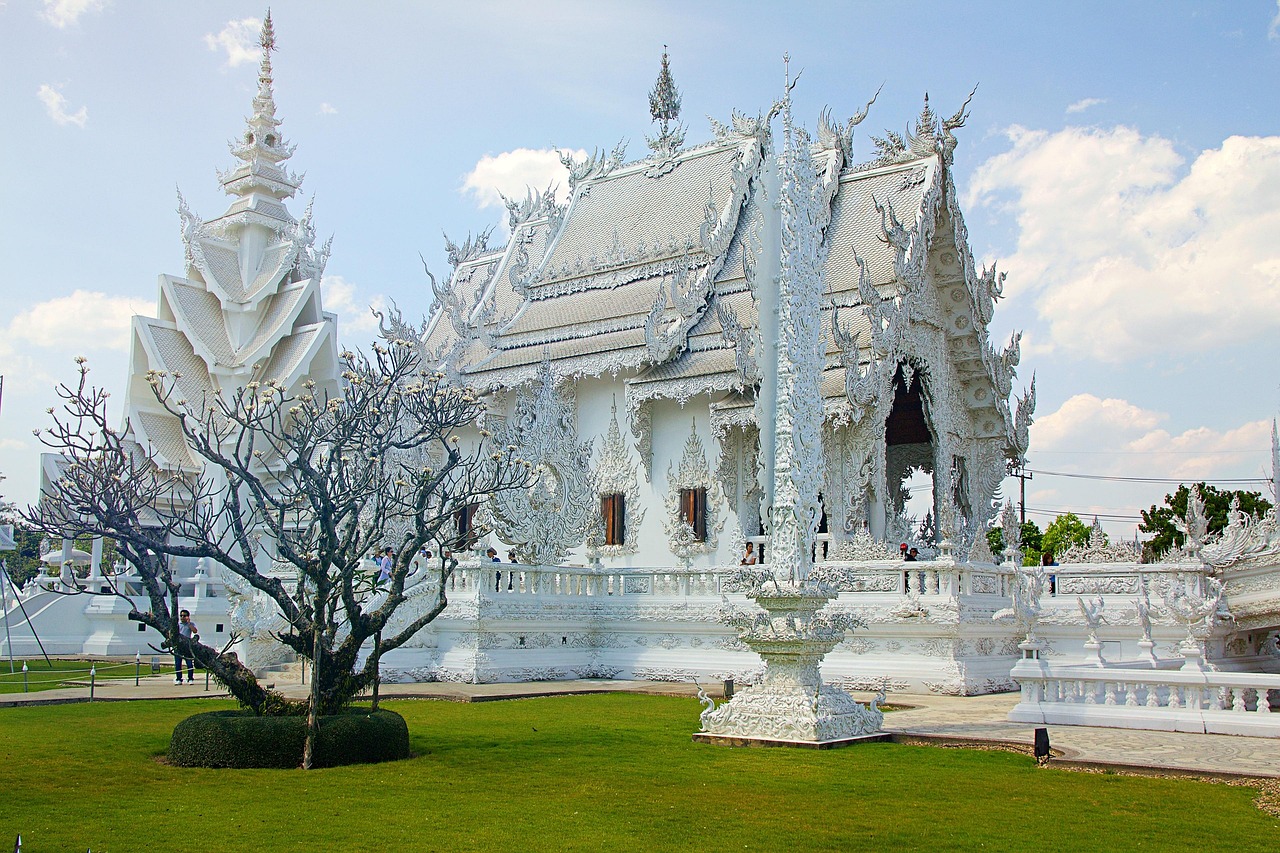 Wat Rong Khun's radiant white facade—a dazzling vision in northern Thailand.
