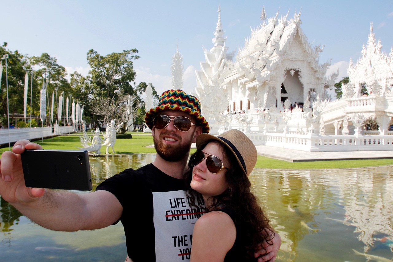 Many travellers capture life-changing moments and reflections at Wat Rong Khun.