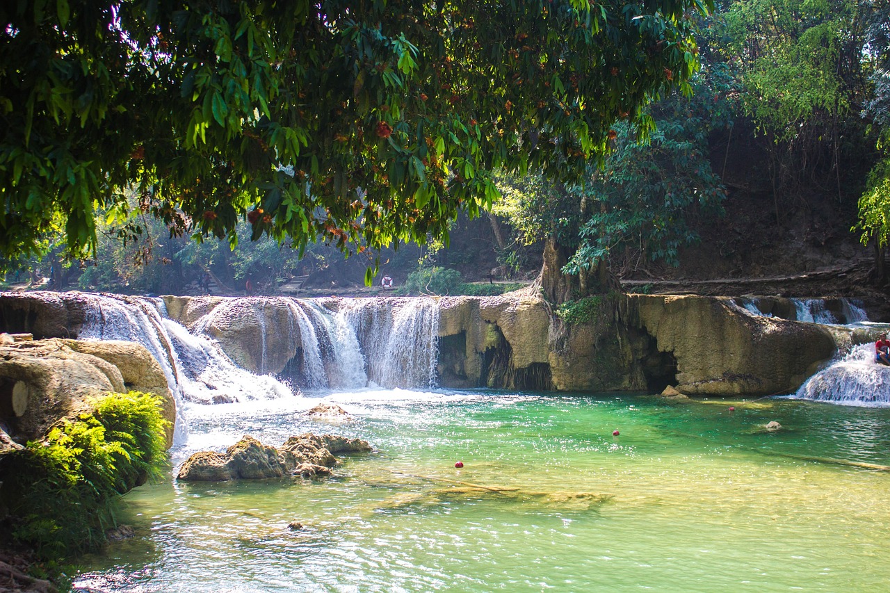 Haew Suwat Waterfall: A cinematic site made famous in 'The Beach,' perfect for tranquil escapes.