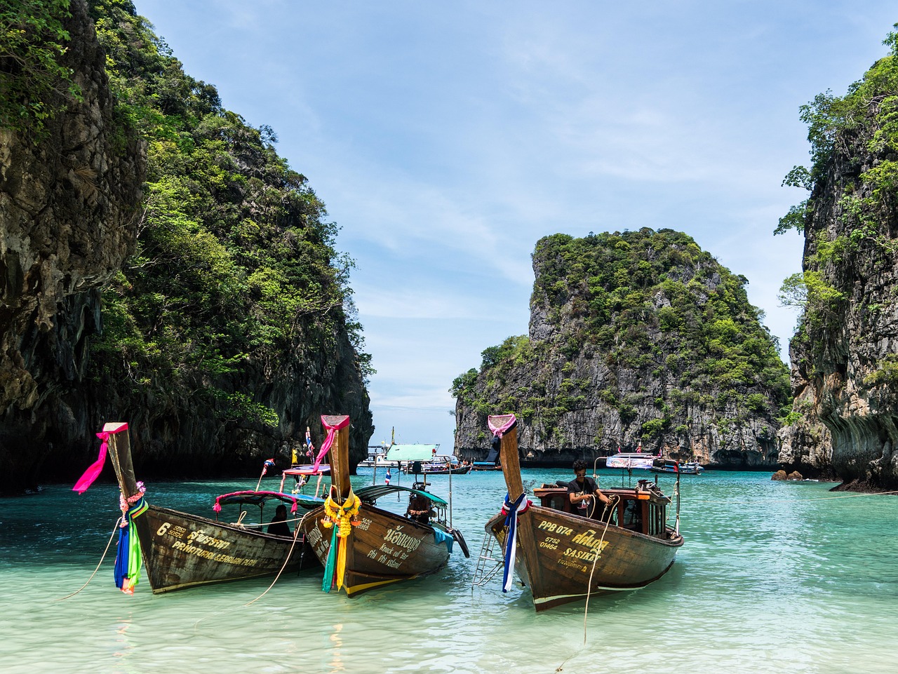 Indulge in the crystal-clear serenity of Koh Phi Phi’s exclusive luxury shores.