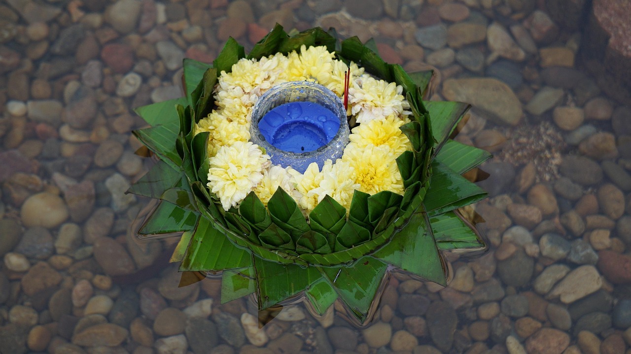 Lanterns and krathongs light up the rivers of Chiang Mai during Loy Krathong.