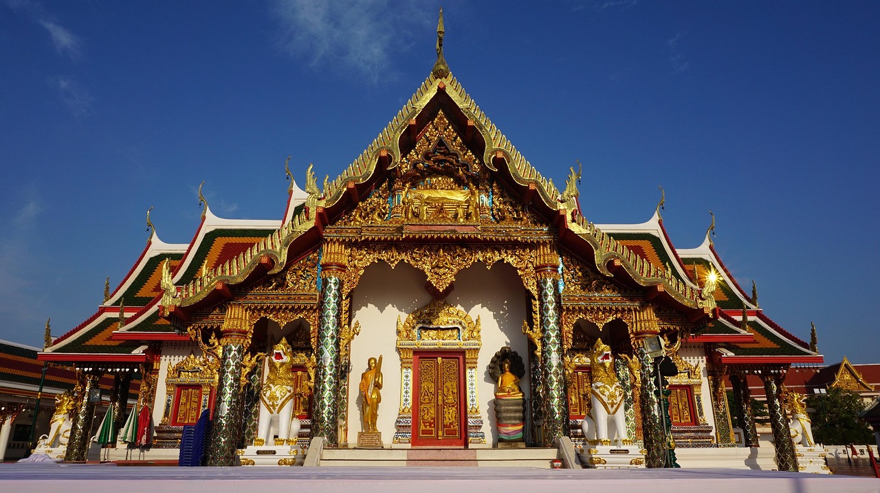 The temple’s murals unfold tales of Thai legends and vibrant history.