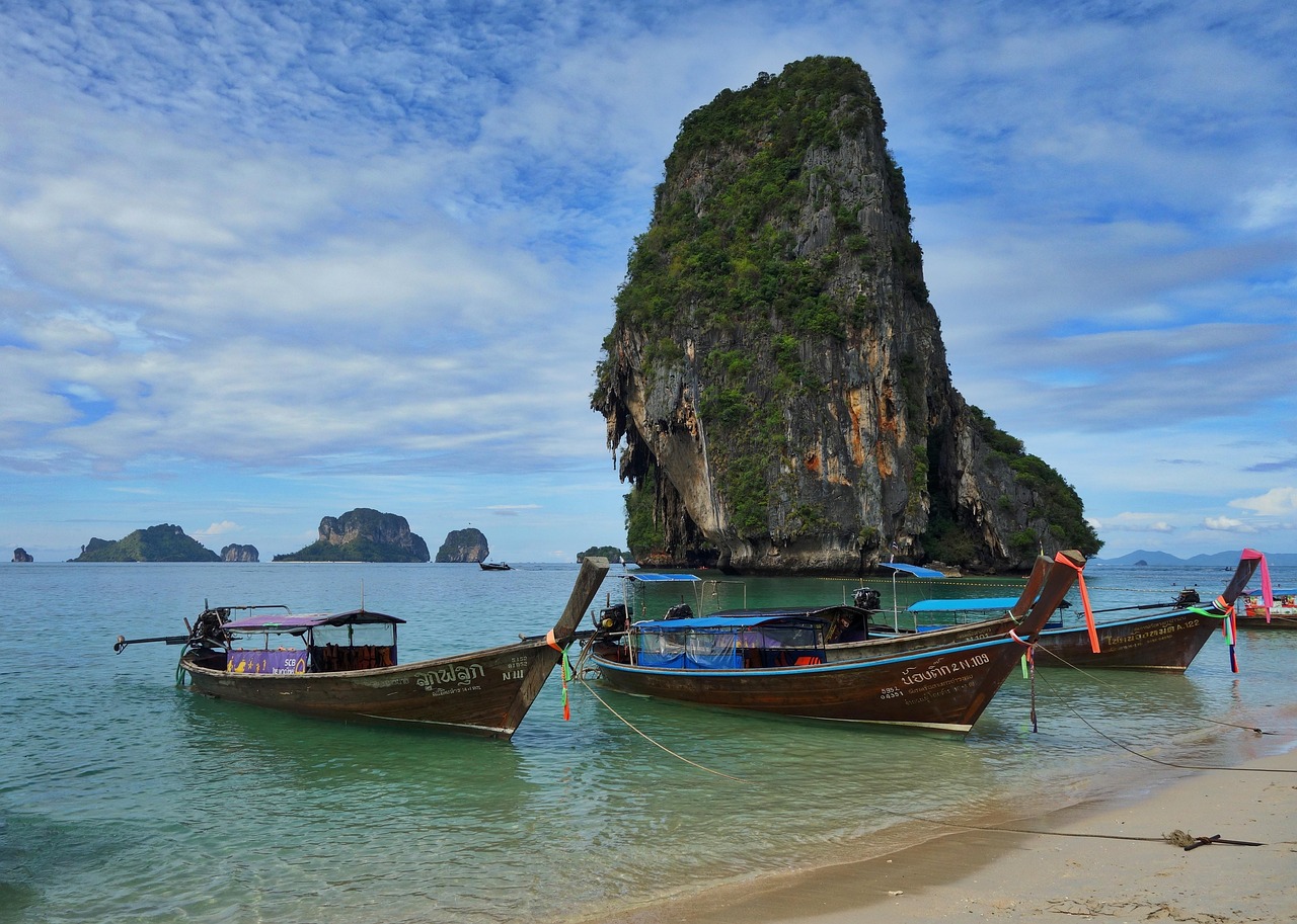 The mystical entrance and shrine of Tham Phra Nang Cave, a place of deep local reverence in Krabi.