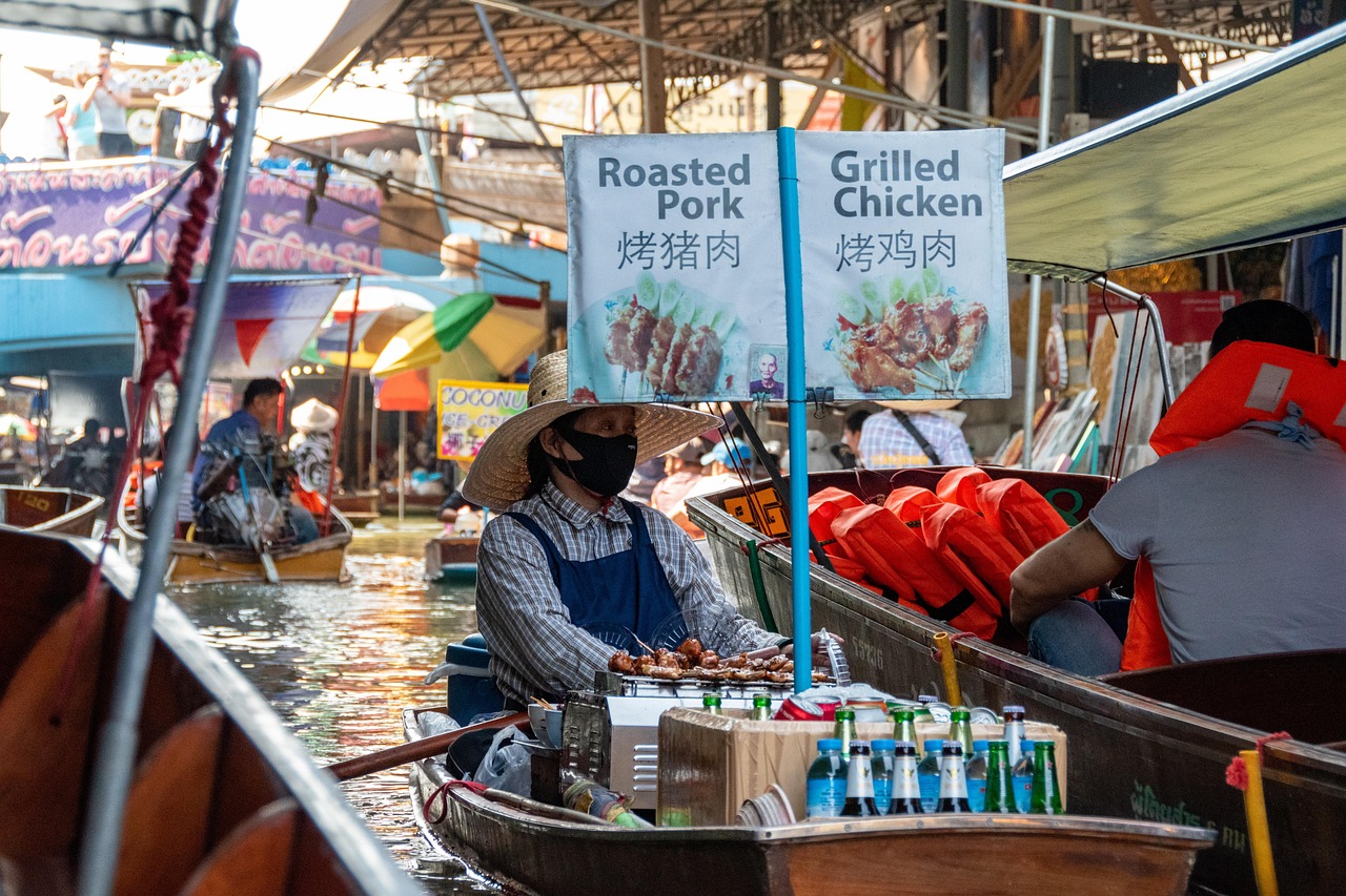 Experience a culinary odyssey as local cooks prepare Thailand’s iconic dishes aboard their boats.