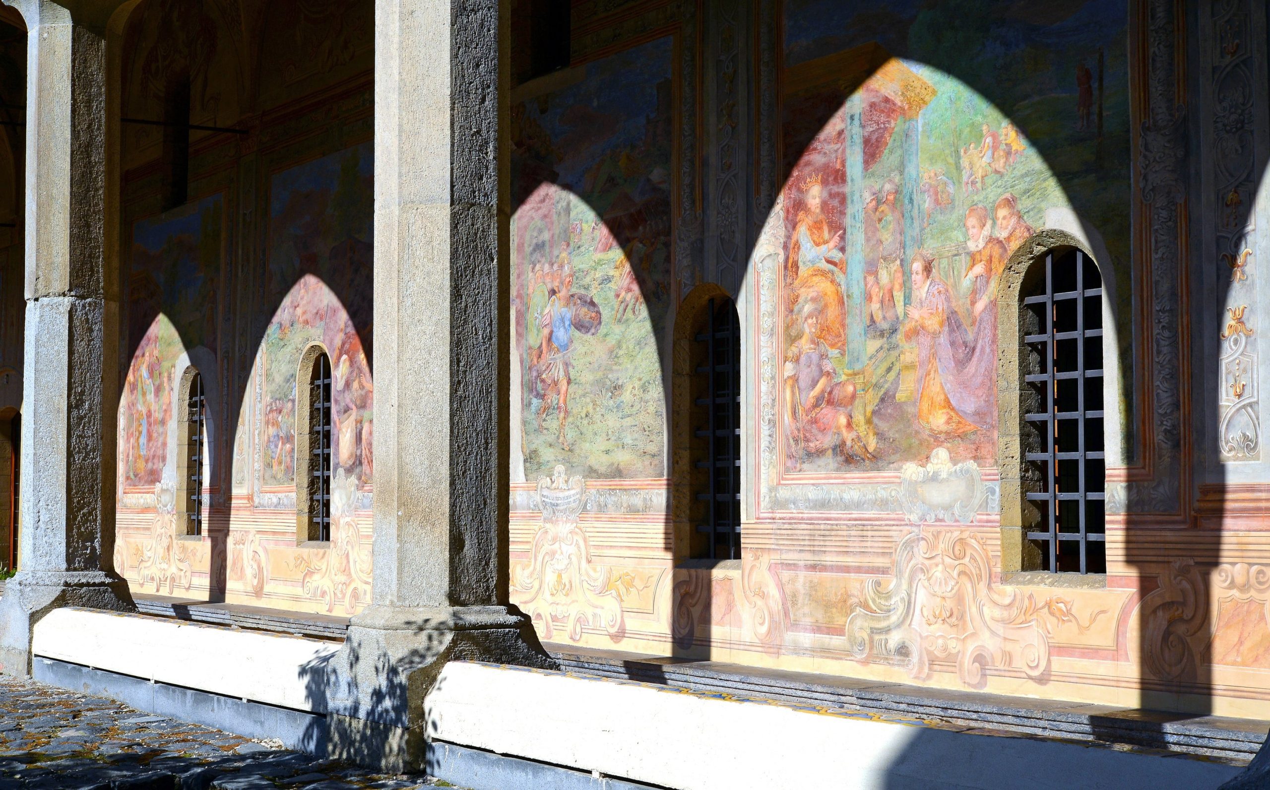 It stands opposite the Church of Gesù Nuovo, on the easternmost leg of Via Spaccanapoli.