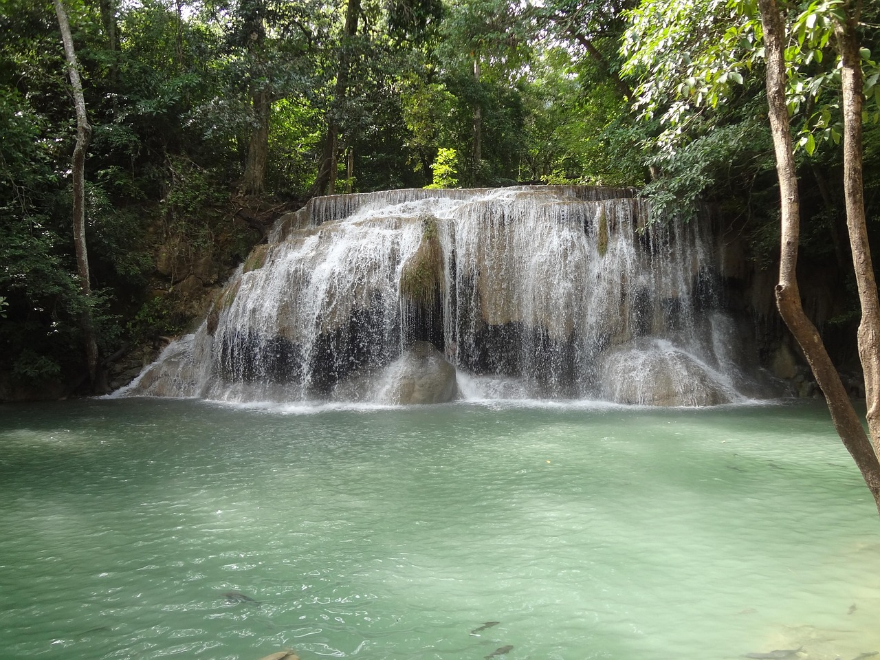 A hidden waterfall in Than Mayom National Park, where adventure seekers find rejuvenation.