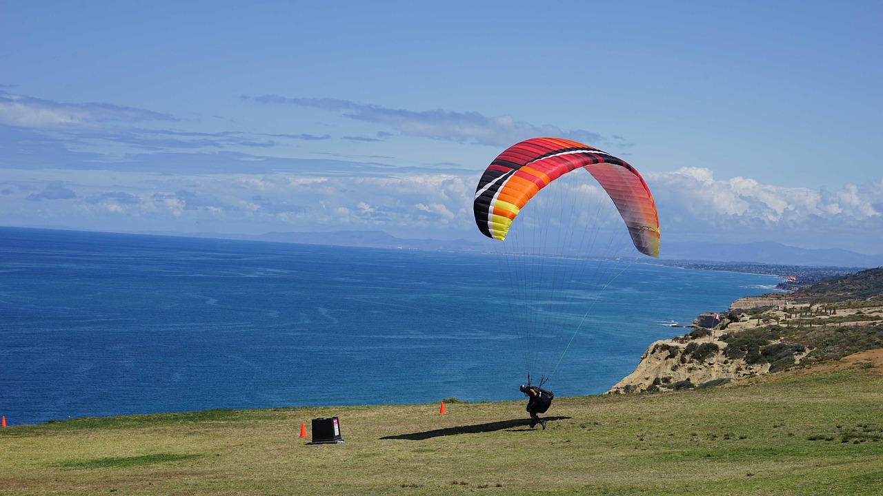 Embrace adventure—paragliding above Etretat’s breathtaking cliffs and sea arches.