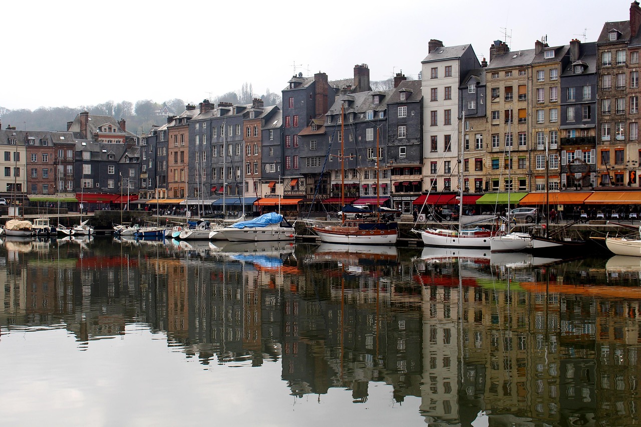 Honfleur’s vibrant old harbor—a haven for artists, culture seekers, and explorers alike.
