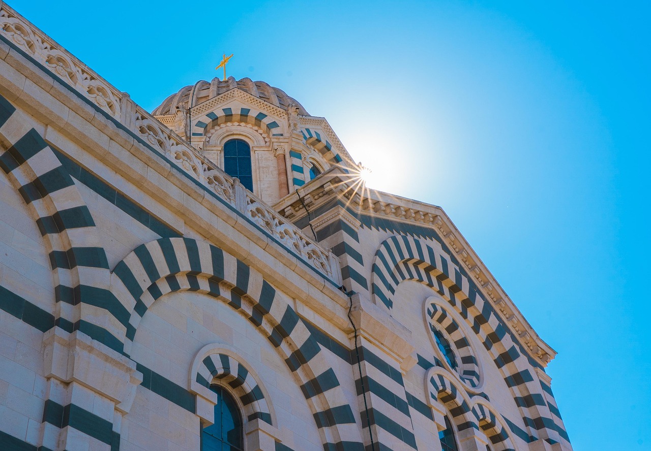 Notre-Dame de la Garde stands sentinel over the city, offering unsurpassed panoramic views of Marseille.