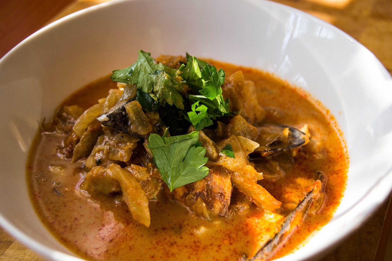 Bouillabaisse: A culinary masterpiece reflecting Marseille’s maritime traditions, best enjoyed with a harbour view.
