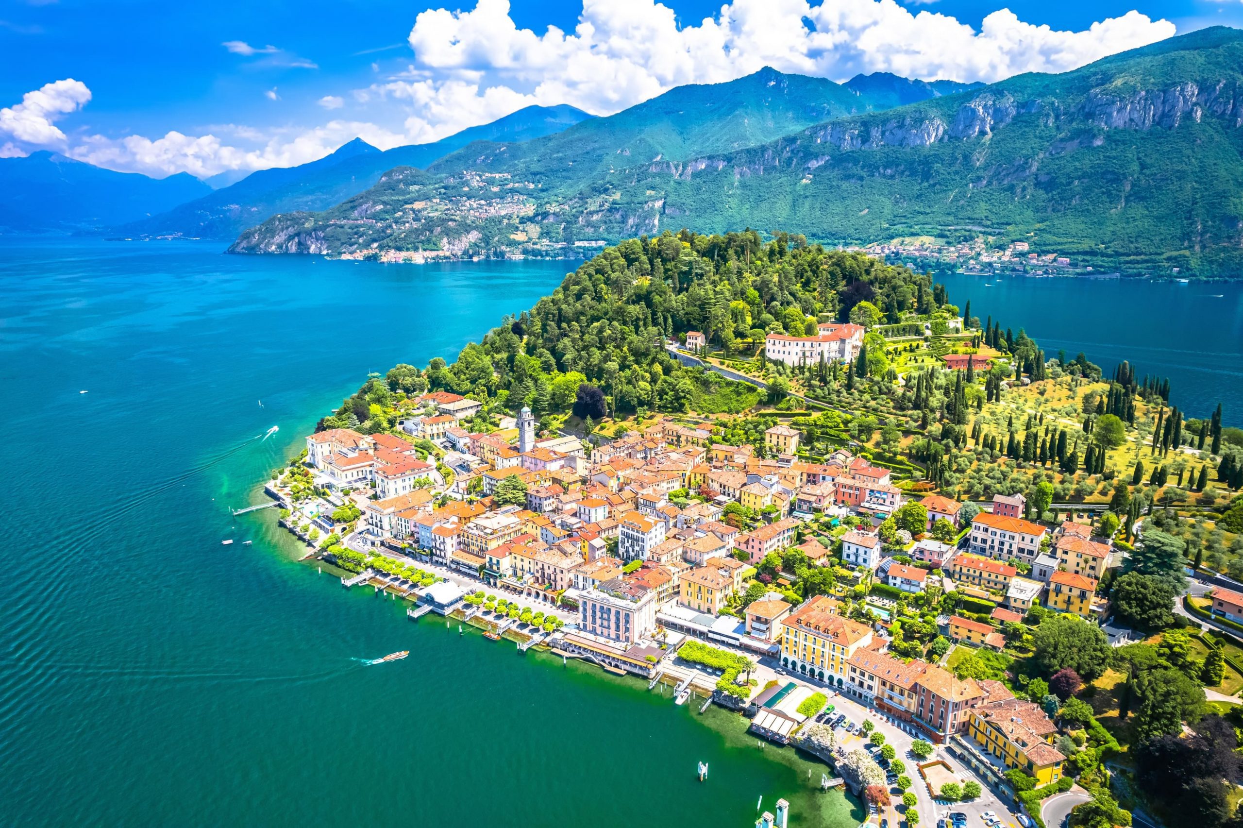 The center is characterized by brightly colored houses and elegant lakeside structures.