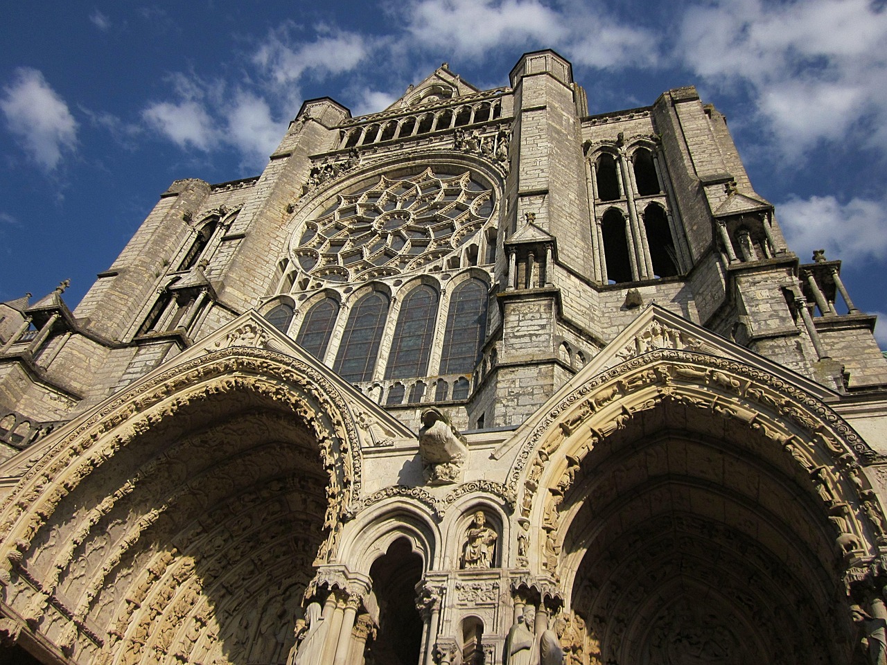 The awe-inspiring façade of Chartres Cathedral, a testament to Gothic artistry and spiritual grandeur.