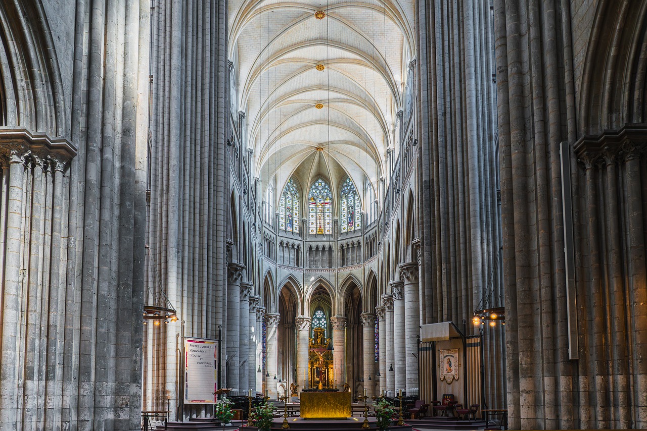 Step inside Rouen Cathedral to discover a world of stained glass, sculptures, and timeless craftsmanship.