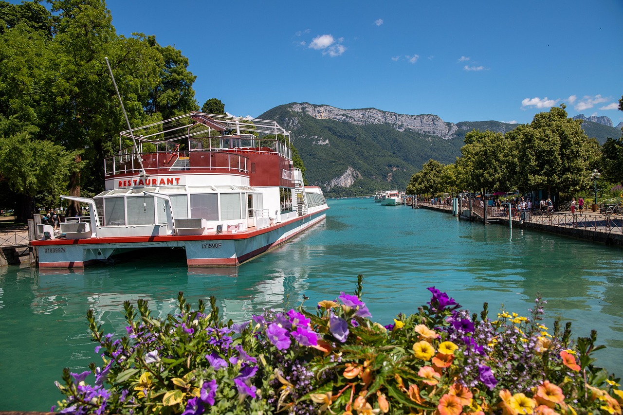 Cycling beneath alpine peaks around Lake Annecy inspires joy and discovery.