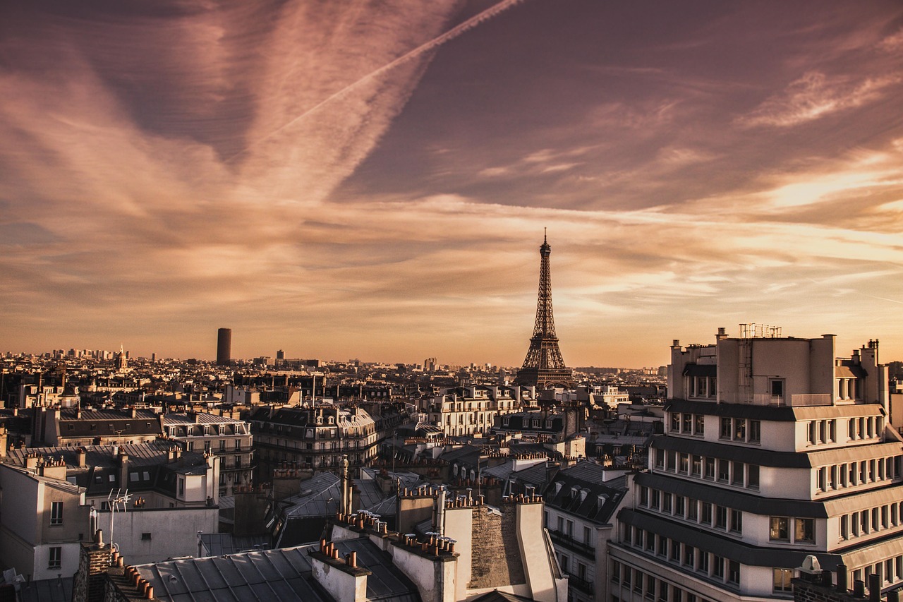 Explore the Eiffel Tower at sunset with private access for a golden Paris in summer moment