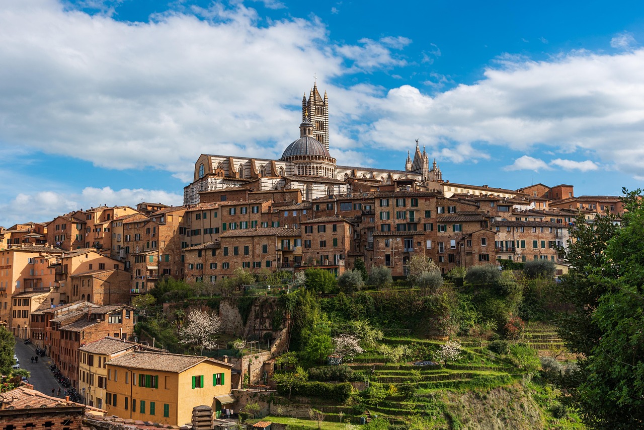 Siena things to do in Siena and why it feels different over the old town rooftops