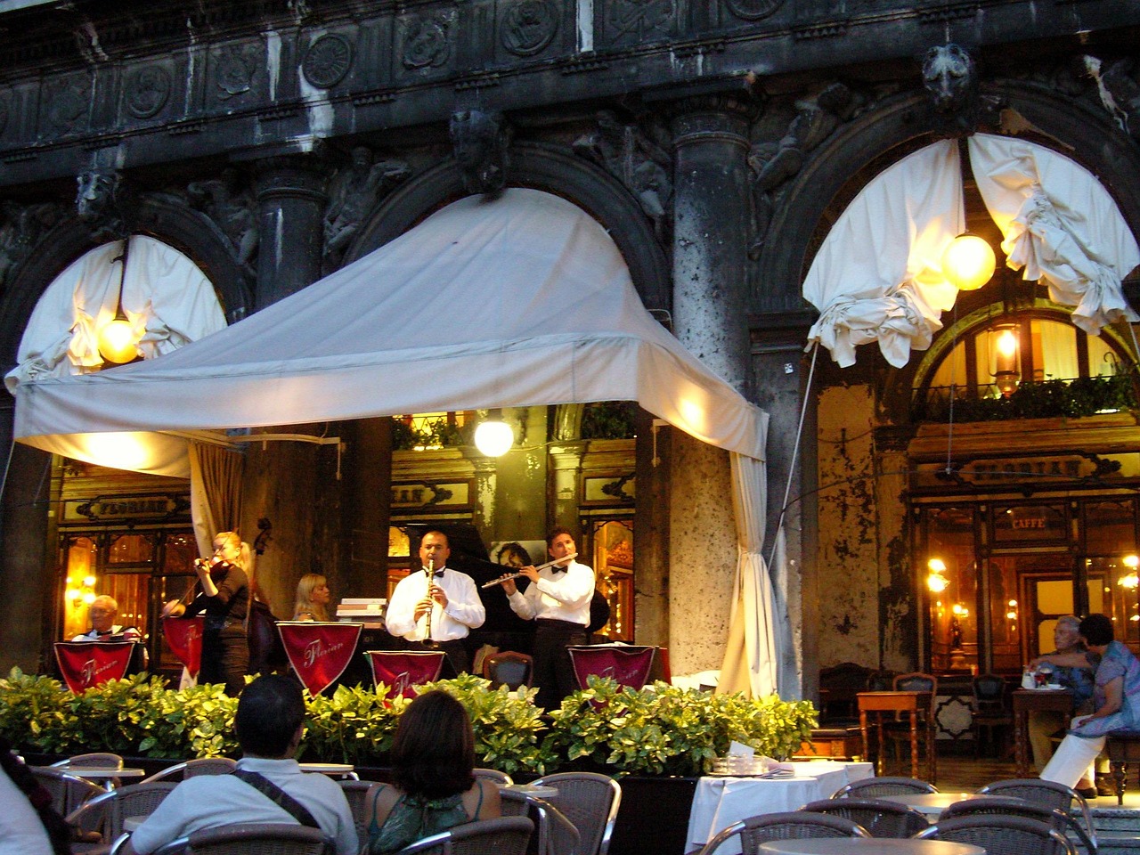 Local Rituals Around Piazza San Marco with historic cafés and late-afternoon light