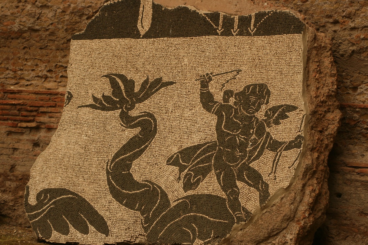 Divers exploring the sunken city of Baia in the underwater archaeological park, ancient mosaic visible
