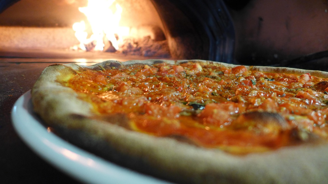 Pizza in Naples and the city’s historic pizzeria legends with a just-baked margherita