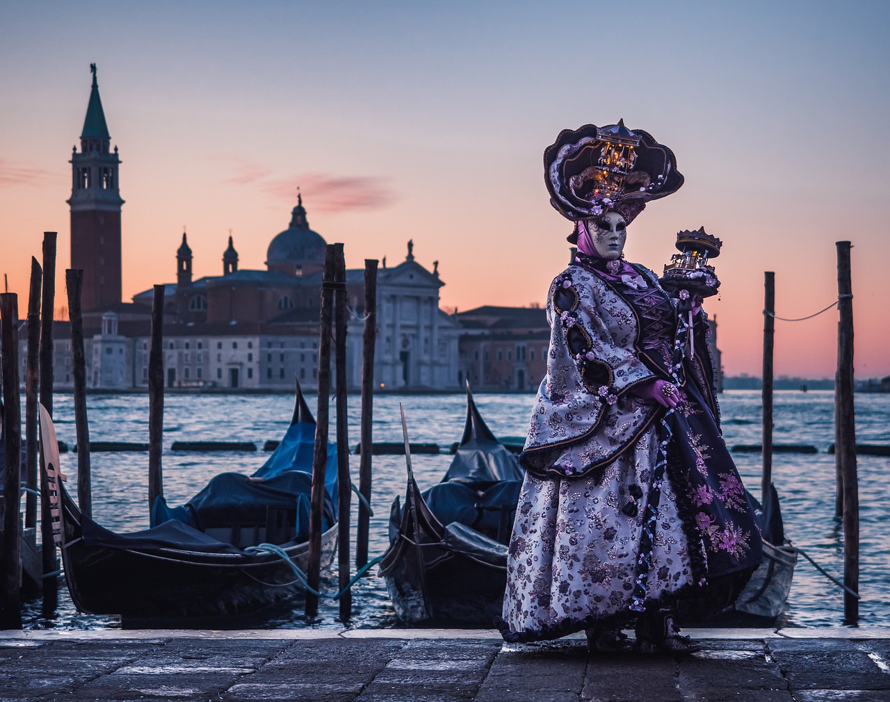 Venice Calendar Carnival, Biennale and Cultural High Notes with masked figures in ornate costume