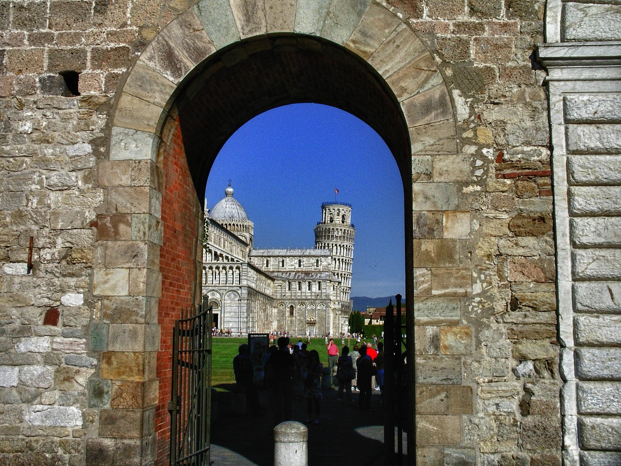 Piazza dei Miracoli and the Leaning Tower Attraction at sunrise in Pisa