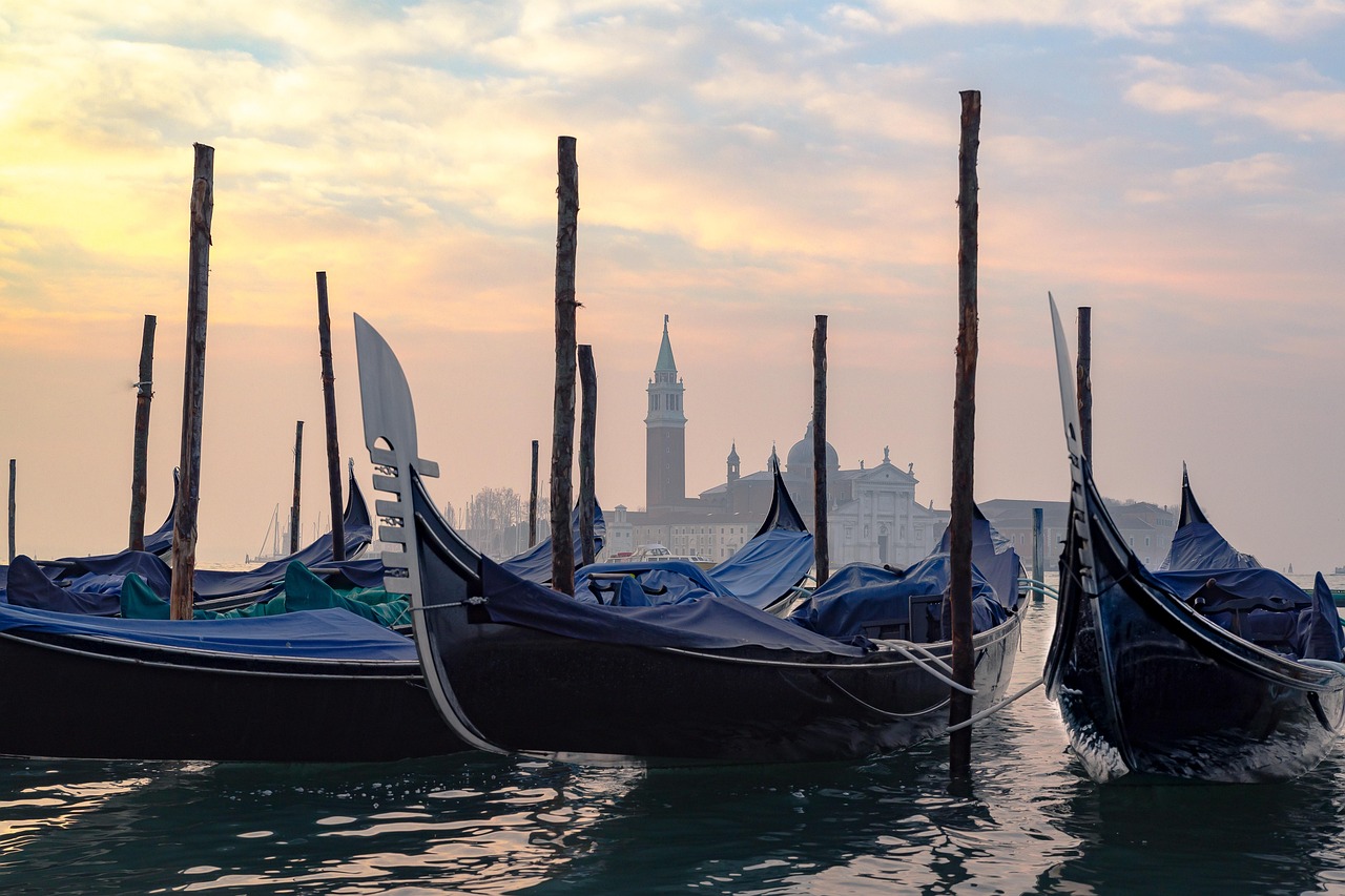 Venice tourist attractions with a quiet romantic gondola through serene canals