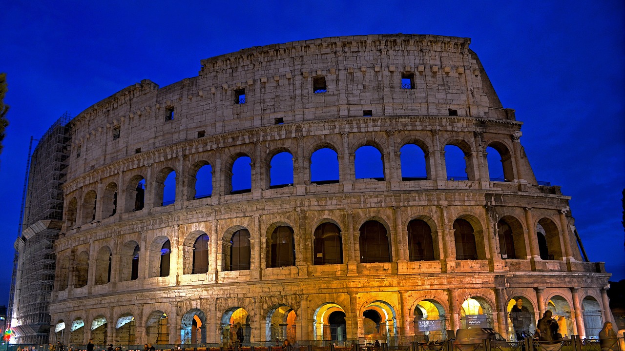 The Colosseum and Ancient Rome After Hours with a quiet, golden-lit amphitheatre