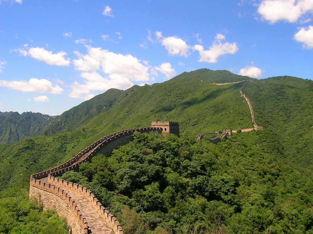 Spring shoulder season in Beijing with soft blossom light and a Great Wall day