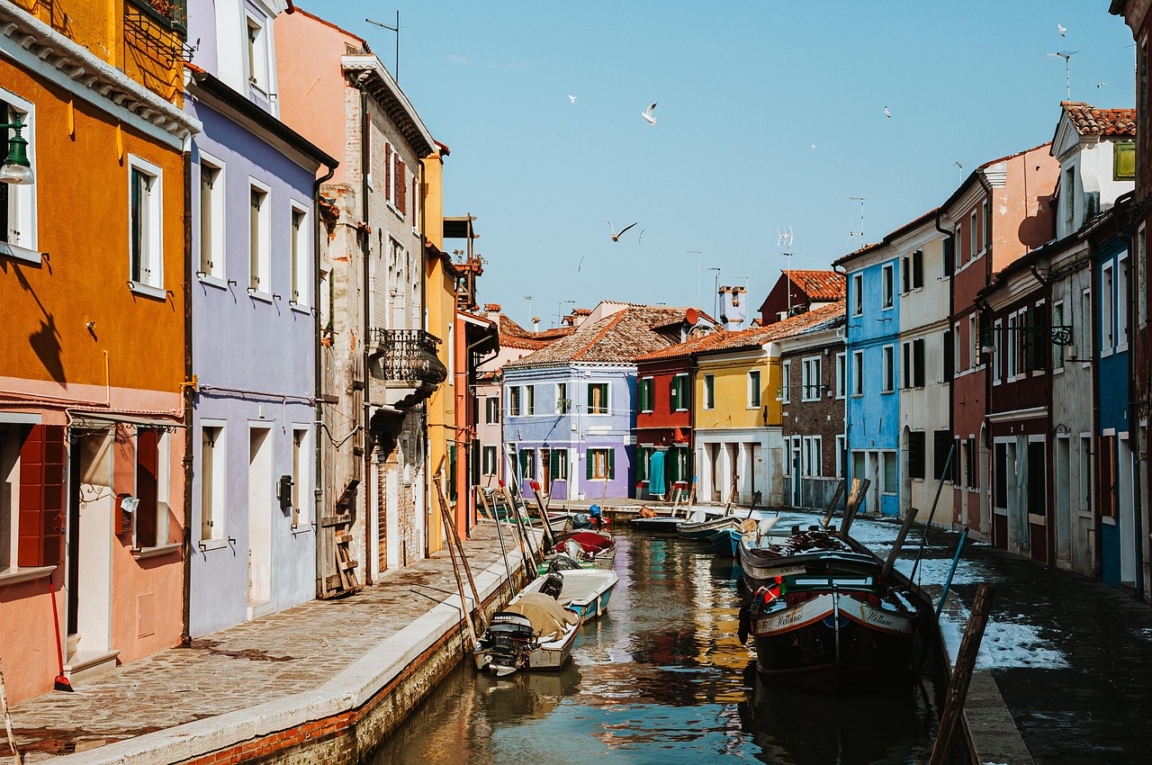 Why Burano is the Most Colourful Day Trip from Venice with rainbow houses along a canal