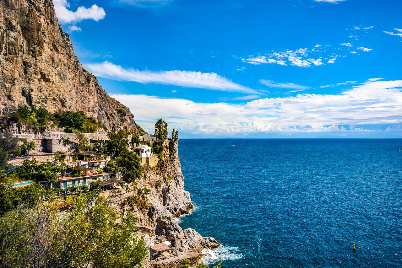 Positano on the Amalfi Coast for Cliffside Glamour with luxury beach clubs and sea views