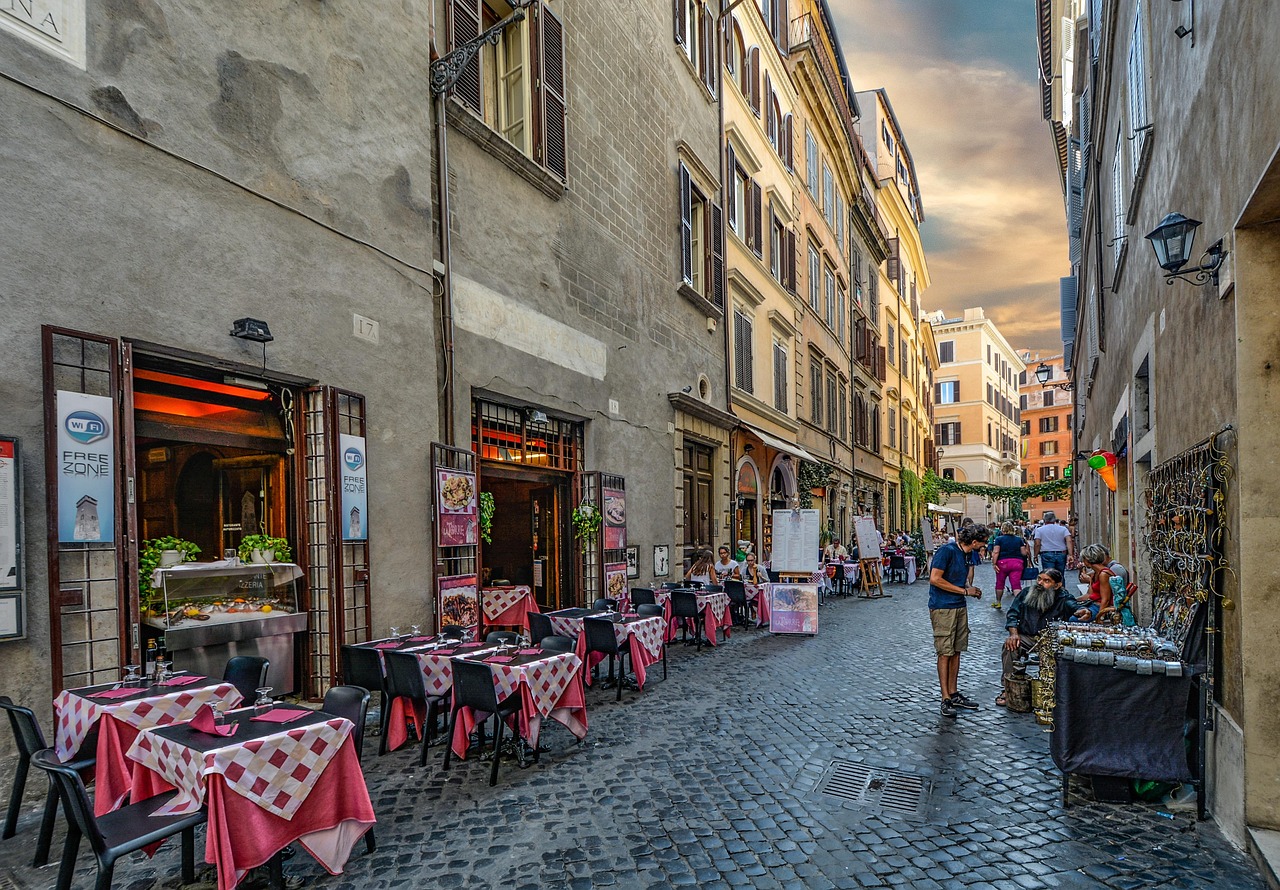 Times to visit Rome by season tourist season peak season Rome with rooftops and soft light