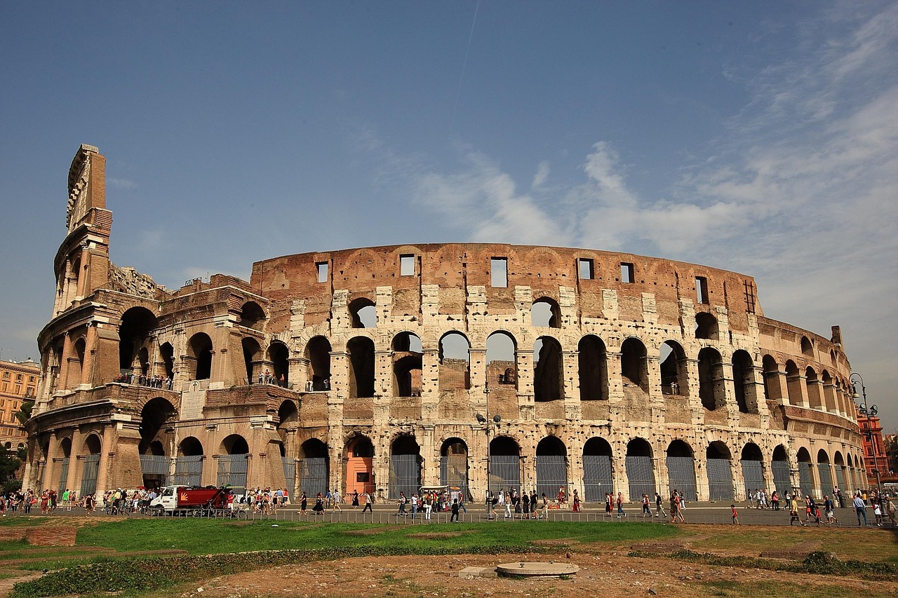 Visit Rome best time to visit Rome Colosseum Vatican Museums Trastevere with morning light on the Colosseum