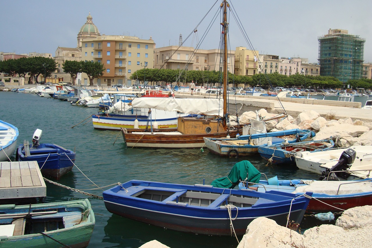 Port and Seafront Life in Pozzuoli with fishing boats and evening light