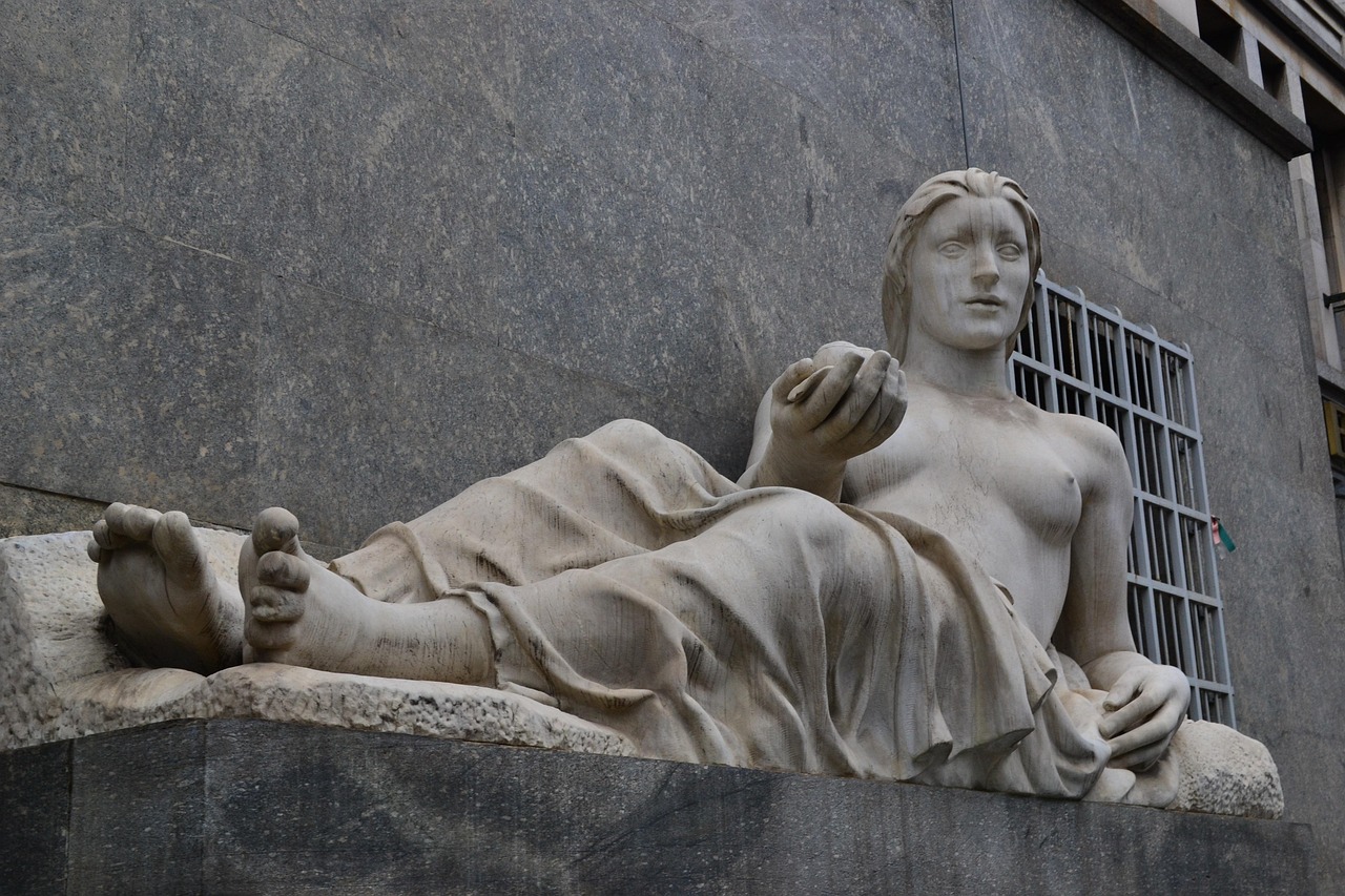 Best things to see in Turin on Via Roma and Piazza San Carlo with graceful arcades and morning light