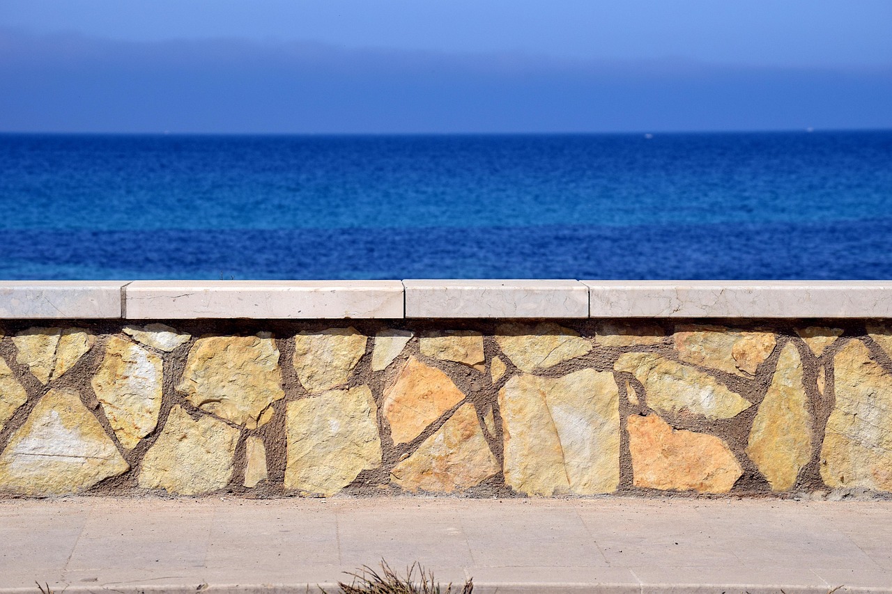 Promenade stroll with stunning views across the Strait of Messina