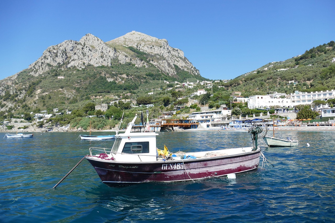 Naples Energy Pompeii and the Amalfi Coast by Boat with cliffs above turquoise water