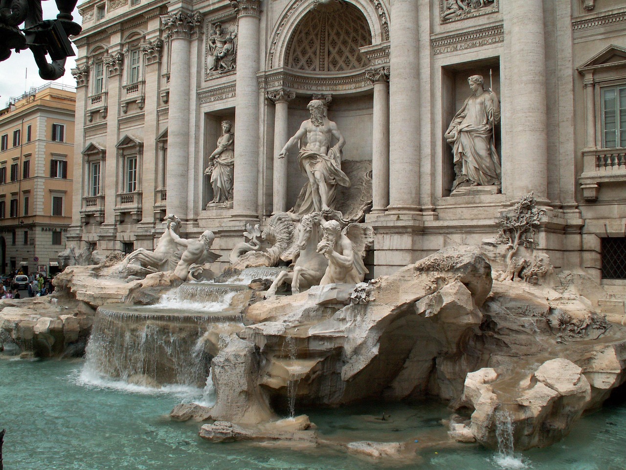 Uncover the Baroque Fountain in Rome with the Trevi Fountain’s sculpted façade