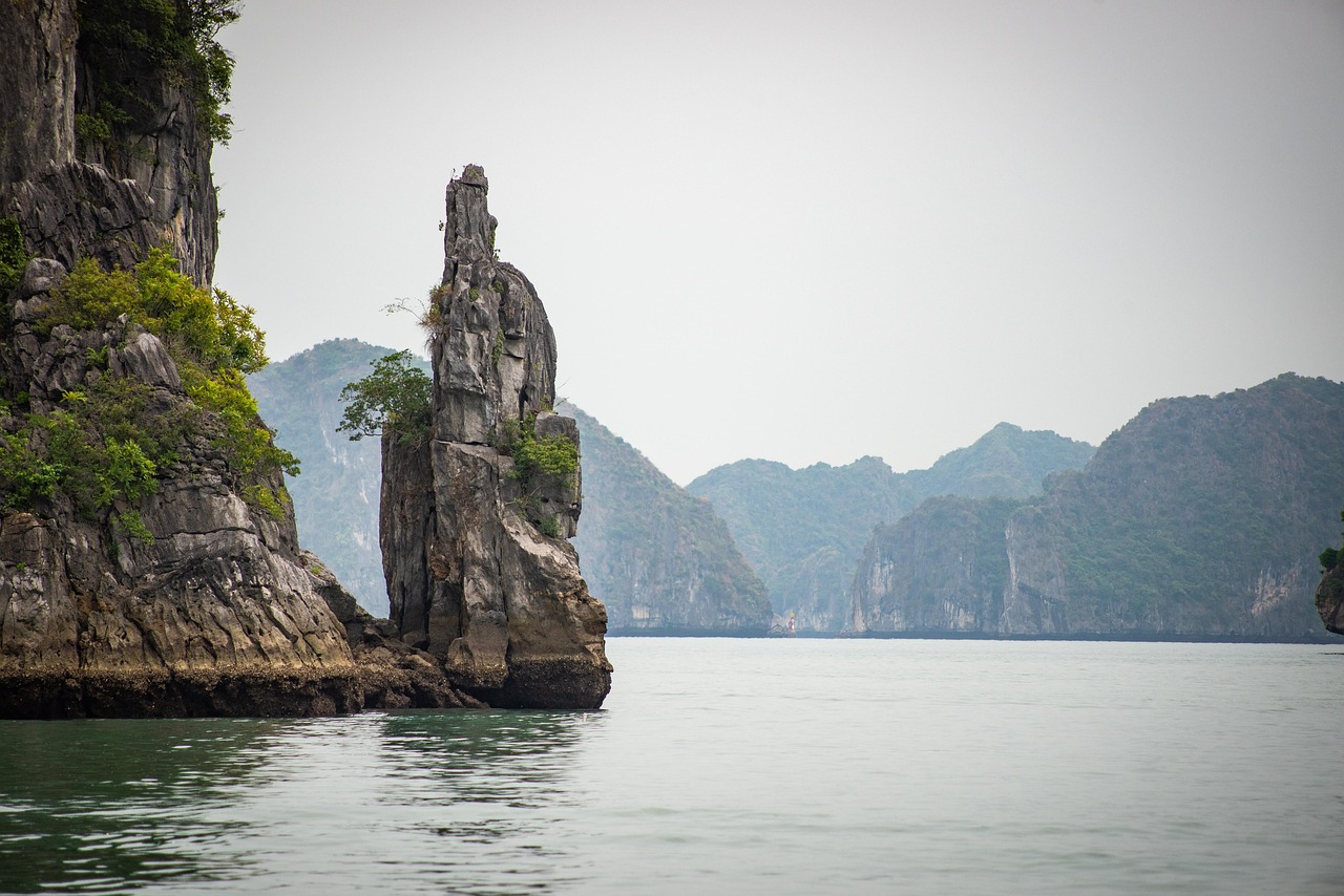 Halong Bay and Lan Ha Bay Private Cruising Experiences on emerald green waters
