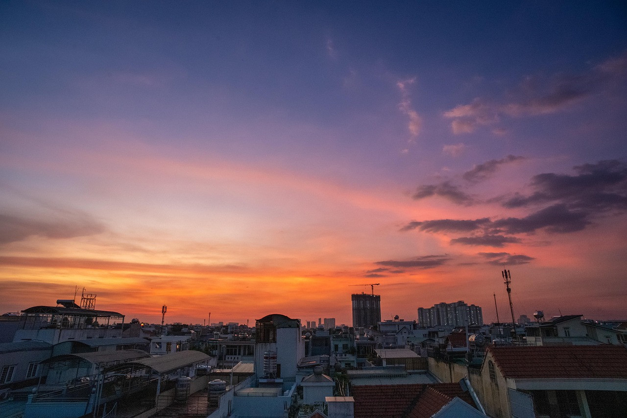 Independence Palace war room and rooftop helipad views over Ho Chi Minh City at sunset