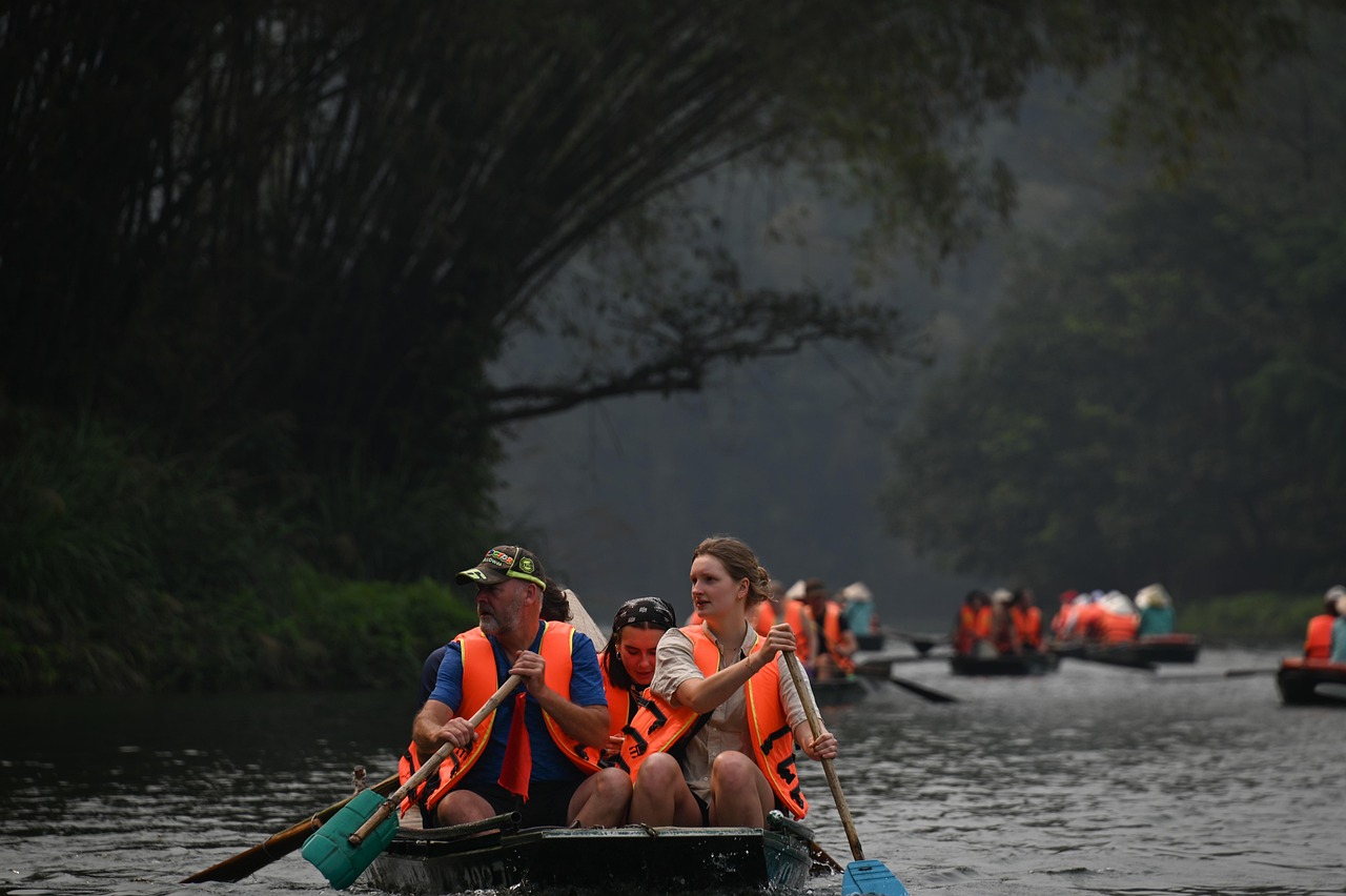 Trang An boat tour Ninh Binh cave boat ride Vietnam in limestone peaks