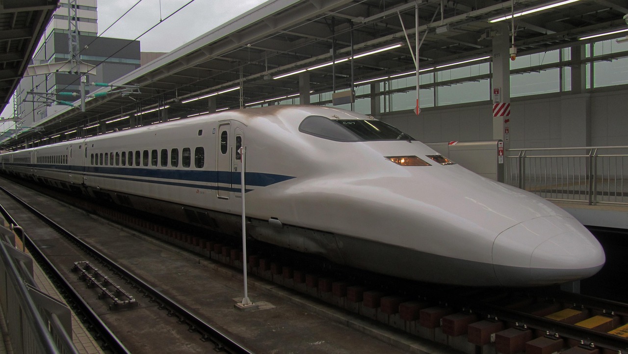 Planning a Trip to Japan with Confidence as the shinkansen bullet train glides through Japan countryside